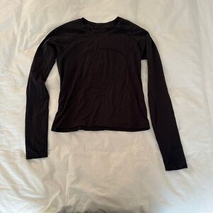 Black race length swiftly tech long sleeve